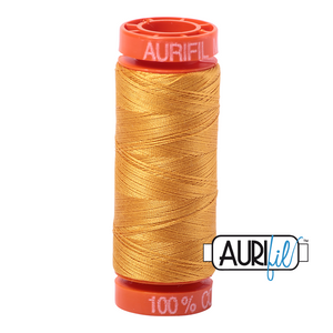 Aurifil 50 wt. 2140 in Small Orange Mustard